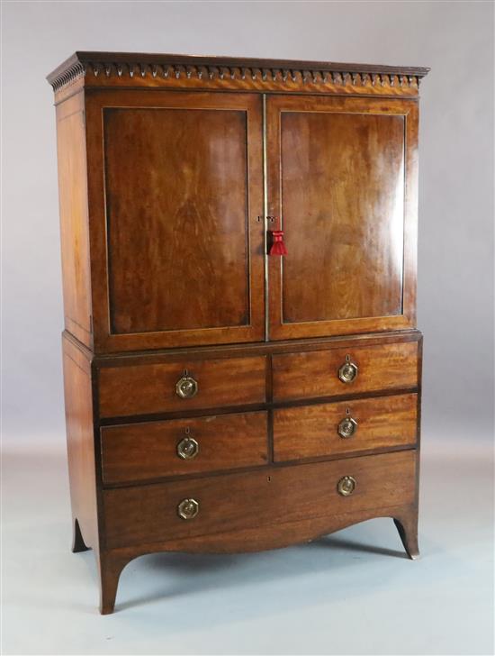 A George III Hepplewhite period mahogany dwarf linen press W. 3ft 9in. D.1ft 10in. H.5ft 6in.